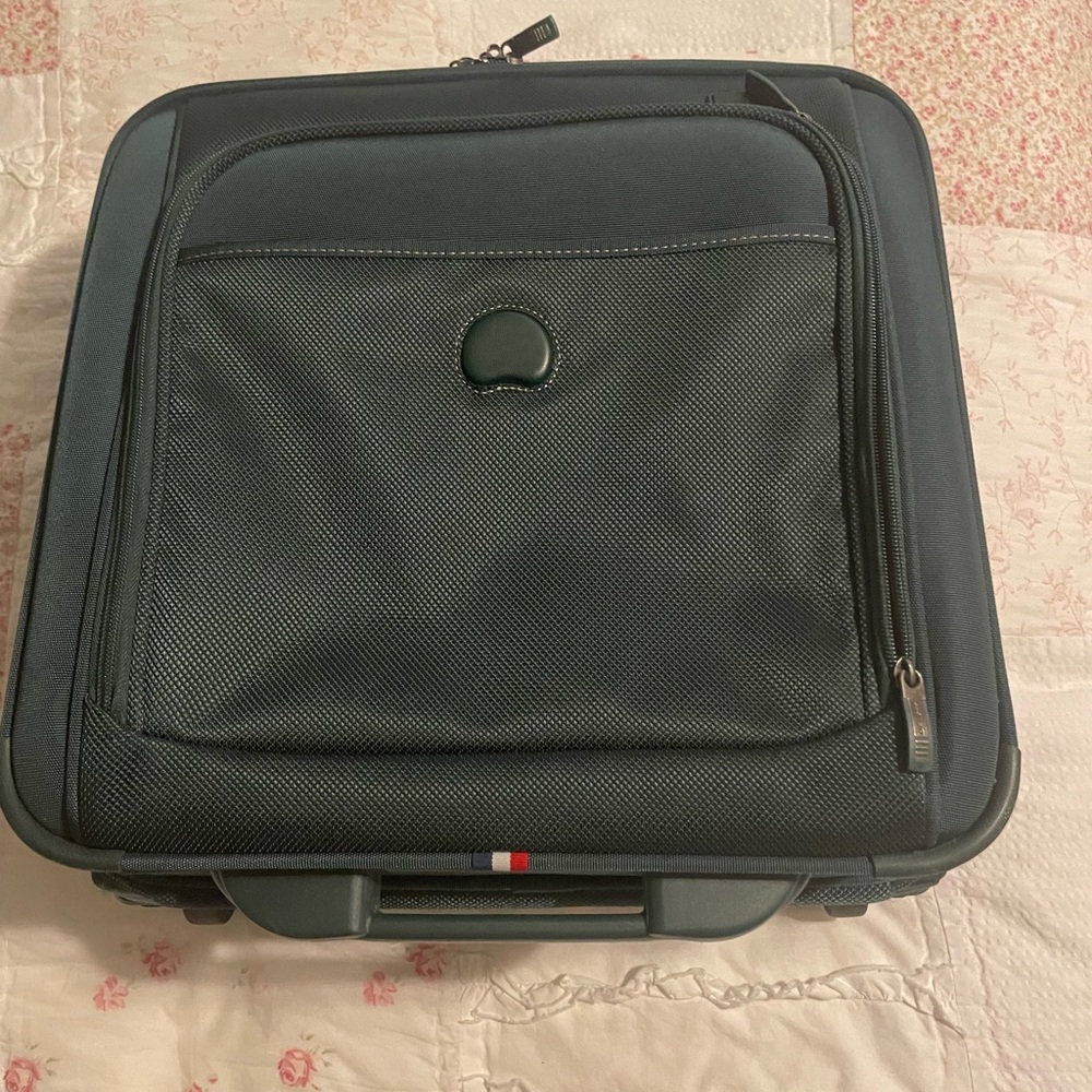Delsey green business carryon, never used